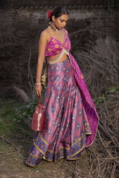 Pink and blue pure silk hand woven patola palazzo with twisted deep neck hand embroidered pink blouse. Paired twisted texture dupatta and potli bag.
Components:4
Pattern:Embroidered
Type of Work:Mirror, Resham
Neckline:V-neck
Sleeve Length:Sleeveless
Fabric:Palazzo: Banarasi; Blouse and Dupatta: Textured Silk
Color:Pink
Other Details:
Tassel hem blouse
Beaded hem blouse and dupatta
Back tie-up blouse
Layered palazzo
Comes with potli bag
Occasion:Destination Wedding - Aza Fashions Festive Bohemian Pre-draped Silk Saree, Festive Silk Palazzo Set With Unstitched Blouse, Bohemian Silk Set For Diwali, Designer Silk Palazzo Set With Unstitched Blouse, Silk Palazzo Set With Traditional Drape Self Design, Traditional Drape Silk Palazzo Set With Self Design, Bohemian Art Silk Pre-draped Saree For Wedding, Silk Palazzo Set With Pallu For Reception, Silk Palazzo Set With Unstitched Blouse For Festivals