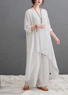 Large Size Loose Art Long White Top Casual Wide Leg Pants Two Piece Suit For WomenFabric: Cotton 45%. Linen 55%Size & Fit:Fit: This garment fits true to size.Length: Size 5XL measures 45.63"from shoulder to hemBust: Great for any cup size.Waist: Loose Fit - comfortable room throughout midsection.Hip: Loose Fit - room for hips. Hand Wash Cold. Long White Top, Loose Art, Womens Casual Suits, Asymmetrical Shirt, Suit For Women, Casual Wide Leg Pants, Sleeveless Short Dress, Linen Maxi Dress, Top Pants Set