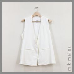 Relaxed Fit White Vest 1 Button Placket 2 Welt Front Pockets Fully Lined 100% Lyocell Wash Cold Bust = S/38" M/42" L/44" Waist = S/39" M/41" L/42" Length = S/26" M/26.5" L/27.5" Feel Free To Ask Any Questions Sorry, No Trades @Mikimakes Chic White Vest For Everyday Wear, Chic White Vest For Everyday, Elegant Everyday Spring Vest, Chic White Vest For Layering, White Button-up Workwear Vest, White Button-up Vest For Work, Sincerly Jules, White Vest, Sincerely Jules