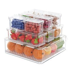 three clear containers filled with different types of fruits and veggies on top of each other