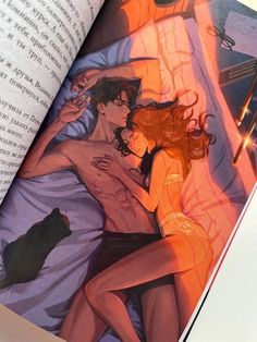 an open book with illustrations of two people laying in bed