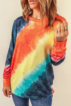 This Ombre Tie-Dye Long Sleeve Top is the perfect addition to your wardrobe. Crafted from a lightweight and breathable 95% Polyester and 5% Spandex blend, this top is designed to keep you comfortable all day long. The ombre tie-dye pattern adds a unique touch to this classic style, making it a great choice for any occasion. The long sleeves and relaxed fit provide a flattering silhouette that is sure to turn heads. Whether you're heading to the office or out for a night on the town, this ... Casual Ombre Cotton Tops, Trendy Gradient Color Tops For Spring, Blue Casual Top With Watercolor Print, Casual Gradient Relaxed Fit Top, Casual Blue Watercolor Print Top, Blue Casual Watercolor Print Top, Tie Dye Tops For Spring Loungewear, Spring Tie-dye Tops For Loungewear, Spring Tie Dye Tops For Loungewear