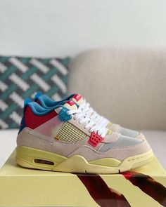 Union LA x Air Jordan 4 'Guava Ice' sneakers with a beige suede upper, vibrant pink, blue, and yellow accents, and vintage-inspired yellow midsole Jordan 4 Union, Jordan 4’s, Designer Footwear, Buy Jordans, Jordan 4 Retro, Bottega Veneta Shoulder Bag, Air Jordan 4, Air Jordan 4 Retro, Loafer Sneakers