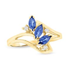 Redefine elegance with this splendid gemstone ring. Crafted in warm 14K gold, this captivating design highlights a trio of 5.0 x 2.5mm marquise-cut bright blue sapphires, each set at a graceful diagonal across the ring's bypassing split shank. Sparkling diamond accents add a touch of whimsy and shimmer to the look. Simply marvelous, this ring is buffed to a brilliant luster. Marquise Sapphire And Diamond Ring With Accent Stones, Marquise Birthstone Ring In 14k Gold, 14k Gold Marquise Birthstone Ring, Formal Marquise Birthstone Ring, Blue Diamond Cut Marquise Ring, Blue Marquise Diamond Ring With Diamond Cut, Marquise Sapphire Diamond Ring, Marquise Sapphire Promise Ring, Formal Marquise Diamond Ring With Birthstone