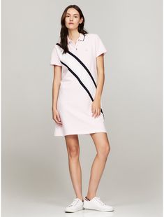 Tommy Hilfiger women's dress. It's everything you love about our polos—styled as a dress and made from soft, comfortable stretch cotton.  Material: 97% Cotton, 3% Elastane. Casual Cotton Polo Dress For Work, Casual Summer Polo Dress For Daywear, Casual Polo Dress For Work, Elegant Polo Dress For Daywear, Classic Fitted Cotton Polo Dress, Spring Casual Polo Dress For Daywear, Casual Spring Polo Dress For Daywear, Casual Spring Polo Dress, Cotton Collared Polo Dress