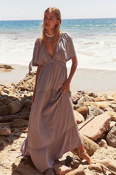 Forever free and flowy, this effortless maxi dress from our free-est collection is featured in a V-neck, tiered silhouette with flutter sleeves for added shape. * Soft, textured fabrication * Elastic empire waist * Effortless, pull-on style | La La Maxi Dress by free-est at Free People in Grey, Size: L Flowy Outfits, Fall Maxi, Free People Maxi, Free People Maxi Dress, Short Sleeve Maxi Dresses, Wardrobe Inspiration, Family Photo Outfits, Satin Midi Dress, Photo Outfit