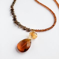 Smokey Quartz Necklace, Brown Teardrop Gemstone Jewelry, Elegant Brown Faceted Necklace, Elegant Amber Gemstone Beads, Amber Citrine Necklace With Gemstone Accents, Brown Faceted Jewelry Gift, Smoky Quartz Gemstone Jewelry, Brown Smoky Quartz Gemstone Jewelry, Faceted Briolette Citrine Jewelry