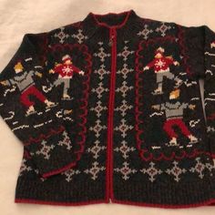 Vintage Winter Ice Skating Zippered Front Christmas Sweater Ice Skaters On Front, Back, And Arms Of Sweater. Dark Gray With Red Trim 52% Ramie, 40% Cotton, 5% Wool, 3% Rayon Good Vintage Condition With Some Loose Threads As Shown. Smoke Free Home Measurements (When Zipped) Are Approx 21.5” From Pit To Pit And Almost 23” From Bottom Collar To Bottom Hem. Vintage Christmas Sweater, Ice Skating Sweater, Zip Front Christmas Sweater, Winter Sweater Ice Skating Vintage, Winter Ice Skating, Vintage Christmas Sweater, Vintage Christmas Sweaters, Holiday Sweaters, Ice Skaters, Winter Sweater, Holiday Sweater, Vintage Winter