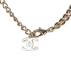 This Chanel necklace is in light gold tone metal with a rhinestone filled star, imitation wax seal stamped CC pendant, and a lobster claw clasp closure. Origin: Italy Condition: New and never worn Accompanied by: Chanel box, pouch, carebook, ribbon, and retail UPC Measurements: 14.75" chain Wax Seal Logo, Chanel Box, Star Necklace Gold, Chanel Necklace, Box Pouch, Seal Logo, Quality Handbags, Wax Seal Stamp, Seal Stamp