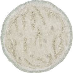 a round rug with fringes on the bottom and an oval design in grey, white and