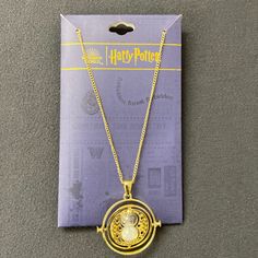 the harry potter necklace is in its packaging