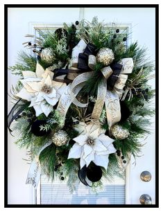 a christmas wreath hanging on the front door