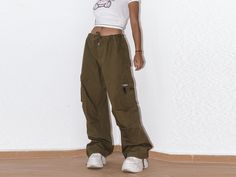 Stunning Nike ACG Super Wide Cargo pants with its original tags. Size tag L. Waist 46cm (x2) Length 108cm Bottom wideness 24cm Model size is woman 1m63/5.4 feet and usually wear S/M. It's a big for her. Our policy : All items are authentic vintage pieces and are one offs; signs of wear and tear add to their authentic identity. No refund or exchanges. Orders are shipped within 1 to 4 days. Please allow 0.5-2cm differences due to manual measurement. 90s Nike, Nike Vintage, Harajuku Style, Nike Acg, Harajuku Fashion, Vintage Pieces, Vintage Nike, Size Tag, Trousers Women