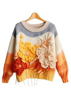 a colorful sweater with flowers on it