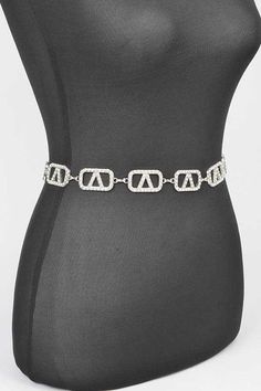 Complete your outfit with our Plus Size Rhinestone Logo Chain Belt. The sparkling rhinestones and sleek chain design not only add a touch of elegance but also provide comfortable support. Perfect for accessorizing your favorite dress or jeans, this belt is a must-have for any stylish plus size wardrobe. Plus Size / AdjustableWidth - 1"Length - 57.5"Composition - Rhinestone, MetalLead & Nickel Compliant Trendy Evening Jewelry With Chain Strap, Silver Bling Belts For Party, Adjustable Chain Belt For Formal Occasions, Silver Party Belt With Bling, Adjustable Metal Party Belt, Trendy Silver Belt For Party, Trendy Silver Belts For Party, Silver Rhinestone Belt For Party, Trendy Silver Party Belt