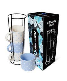 a blue and white cup next to a cardboard box with two cups in front of it