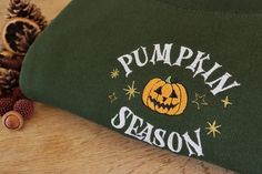 Handmade embroidered Pumpkin Season design onto a unisex sweatshirt, perfect for those chilly autumn days! Past customers have worn this for cute pumpkin picking photos or it makes a great subtle Halloween sweatshirt! ✯PRODUCT DETAILS✯ ✯ECO SWEATSHIRT✯  Currently only available in Size Small, Medium and Large  The eco sustainable sweatshirt is made to a very high quality, it's crafted from premium organic and recycled fabrics.  It's 350gsm (so nice and thick) and the inside is a super soft brush Green Hoodie With Letter Embroidery For Fall, Green Embroidered Fall Hoodie, Fall Cotton Sweatshirt With Embroidered Patch, Embroidery Fall, Embroidered Pumpkin, Clothing Embroidery, Cozy Halloween, Cold Autumn, Autumn Clothing