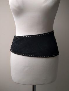 Vintage wide belt made of suede leather - asymmetrical with metal studs. From the 80s or 90s. Good vintage condition. No flaws that I could see. Mannequin is roughly 25 waist Wide Black Belt, Party Belts With Rivets, 2024 Predictions, 1950s Boys, 80s Belt, Stud Belt, Beach Jacket, Digital Wardrobe, Studded Belt