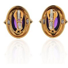 Step into the enchanting world of David Webb with these exquisite Platinum & 18K Yellow Gold Cabochon Amethyst And Diamonds Earrings. Prepare to be captivated by their timeless elegance and impeccable craftsmanship.Crafted in lustrous 18K yellow gold, these vintage earrings boast a pair of oval-cut cabochon amethysts, radiating a rich and alluring purple hue. The amethysts are delicately embraced by a halo of pave-set diamonds, creating a dazzling display of light and sparkle.With a length of 30 Elegant Purple Clip-on Earrings For Formal Occasions, Elegant Purple Cabochon Earrings, Luxury Formal Clip-on Earrings With Cabochon, Luxury Cabochon Clip-on Earrings For Formal Occasions, Formal Purple Clip-on Jewelry, Luxury Gemstone Clip-on Earrings For Formal Events, Luxury Gemstone Clip-on Earrings For Formal Occasions, Purple Clip-on Earrings For Formal Occasions, David Webb