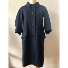 Navy 3/4 Sleeve Button Front Coat With Collar. Modified Raglan Sleeves With Underarm Side Panel. Sleeves Are Constructed Round And Articulated. Two Front Welt Pockets With Flaps. Unlined. 100% Cotton Elegant Outerwear With Button Closure, 3/4 Sleeve, Elegant 3/4 Sleeve Outerwear With Button Closure, Navy Outerwear With Button Cuffs For Office, Classic Formal Outerwear With 3/4 Sleeves, Workwear Outerwear With Buttons And 3/4 Sleeve, Workwear Outerwear With 3/4 Sleeve And Buttons, 3/4 Sleeve Outerwear With Buttons For Work, Fitted Peacoat With Button Cuffs For Work, Blue Buttoned Career Outerwear