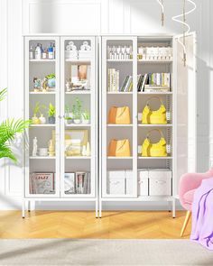 a living room with two white bookcases and a pink chair in front of it