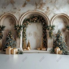 a room decorated for christmas with gold and green decorations on the walls, trees and presents