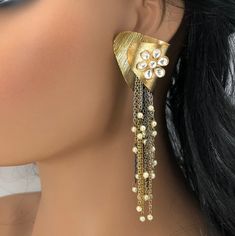 Matte Gold Jhumka/Indian Jhumka/Golden Pearl Jhumka/Traditional Jhumka/Ethnic Golden Matte/Gold finish earrings/Ethnic Indian Long Jhumka Length: Approx. 4.5 Inches This pair of earring is made in Matte Gold finish with Semi precious stone beads with Push back closure. Very Elegant and stylish, these earrings can be paired with any traditional Indian or Western Attire depending upon the occasion and the theme. Very lightweight, hand carved and made with with extreme love and care. This earring w Metal Dangle Flower Earrings For Wedding, Dangle Metal Flower Earrings For Wedding, Party Flower Dangle Earrings For Pierced Ears, Party Flower Dangle Earrings, Traditional Gold Clip-on Earrings For Party, Gold Pearl Earrings With Dangling Beads For Party, Party Drop Pearl Earrings With Dangling Beads, Party Pearl Drop Earrings With Dangling Beads, Gold Dangling Beads Earrings For Party