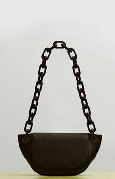 "Pebbled vegan leather purse with chunky acrylic chain. Measures approx. 12.5\" long, 6\" tall, 2\" deep." Everyday Leather Shoulder Bag With Gold Chain, Leather Chain Shoulder Bag For Office, Everyday Leather Shoulder Bag With Chain, Leather Shoulder Bag With Chain Link For Everyday, Brown Leather Shoulder Bag With Chain Detail, Modern Shoulder Bag With Chain For Everyday Use, Leather Chain Link Bag For Everyday Use, Leather Chain Link Shoulder Bag For Everyday, Faux Leather Biker Jacket