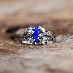 Silver Branches Ring, Lapis Lazuli Ring, 925 Sterling Silver Ring, Leaves Celestial Ring, Blue Gemstone Ring, Weeding Rings, Christmas Gift  SHOP LINK:- https://www.etsy.com/shop/MaaShabashibaJewell?ref=seller-platform-mcnav 》D E T A I L S《 Gemstone: Natural Lapis Lazuli Gem Color: Blue Stone Shape: Marquise Metal: 925 Sterling Silver Purity: 925 Parts Per 1000 Setting Type: Prong Set Silver Polish: High Ring Size: All Size Available Please note that there Can be slight variations in stone texture and color shades in the actual product that you receive. The stone quality or grade will be the same. Because We Use Natural Stones And All Natural Stones Are Not Of Same Textured. All Our Jewelry Is 925 Stamped. Our products are totally handmade and made with high-quality gemstones and sterling Sapphire Cluster Ring In Sterling Silver For Wedding, Sapphire Sterling Silver Rings Gift, Sapphire Sterling Silver Jewelry For Promise, Blue Sterling Silver Cluster Ring For Wedding, Sapphire Sterling Silver Wedding Ring, Sapphire Wedding Rings Stamped 925, Wedding Sapphire Rings Stamped 925, Sapphire Sterling Silver Crystal Ring For Wedding, Sterling Silver Sapphire Stackable Rings For Promise