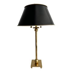 a lamp with a black shade on it