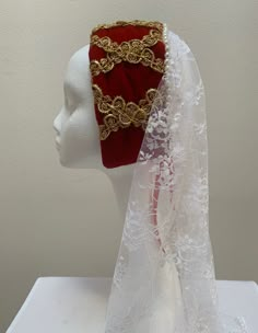 "A new professional quality Renaissance Medieval Elizabethan ladies hat. This cap is a red velvet crown with gold trimming. A row of pearls embellish the back crown with the cascading 21\" lace coverlet. Red ribbon ties hold this regal headpiece in place. New not worn. 16 1/2\" by 3 1/4\". A great item for your reenactment attire, stage production or theme party. Sales final." Medieval Hats Women, Tudor Headpiece, Medieval Veil, Medieval Headpiece, Medieval Headdress, Medieval Headwear, Medieval Fantasy Clothing, Velvet Crown, Medieval Crown