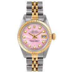 Swiss Wrist - SKU 6917-TT-WMOP-DIA-AM-FLT-JBL Brand : Rolex Model : Datejust (Non-Quickset Model) Gender : Ladies Metals : 14K/Stainless Steel Case Size : 26 mm Dial : Custom Pink Mother Of Pearl Diamond Dial (This dial is not original Rolex And has been added aftermarket yet is a beautiful Custom addition) Bezel : Original Rolex 14K Yellow Gold Fluted Bezel Bracelet : Original Rolex 14K Yellow Gold And Stainless Steel Jubilee Band (This band will fit up to a 6.5 inch wrist) Condition : Fully Serviced, Polished, Time-Tested - Please refer to the images!! Warranty : 1 year warranty. Warranty on the movement is valid 1 year from the date of purchase. Warranty does not cover abuse, accidental damage or water damage. Customer is responsible for shipping expenses in the event warranty work is r Two Tone Datejust, Rolex Datejust Women, Rolex Watches For Sale, Rolex Vintage, Wooden Watch Box, Rolex Diamond, Bezel Bracelet, Expensive Handbags, Crystal Watches