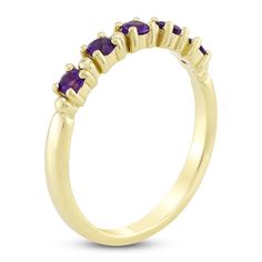 Make your celebration sparkle with this regal amethyst stackable ring. 10K yellow gold Five round natural amethysts—the birthstone of February—gleam along the center Mix and match with other gemstone rings as a way to honor loved ones' birthdays (sold separately) Elegant Purple Stackable Birthstone Ring, Elegant Gold Stackable Amethyst Ring, Gold Amethyst Stackable Rings, Fine Jewelry Amethyst Birthstone Ring In Yellow Gold, Gold Stackable Amethyst Ring In Fine Jewelry Style, Yellow Gold Amethyst Birthstone Ring With Prong Setting, Gold Amethyst Stackable Ring In Fine Jewelry Style, Gold Amethyst Stackable Ring Fine Jewelry, Gold Stackable Amethyst Ring