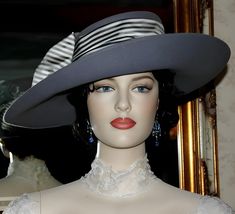 This gorgeous Edwardian hat "Lady Olivia" will turn heads wherever you go! Crafted with a luxurious gray wool, this hat is the perfect way to add a playful elegance to your ensemble. Available in Light Dove Gray or Dark Gray the classic oval shape of this Edwardian design is accentuated with shimmering charcoal gray striped Dupioni silk and lovely gray organza flowers. Whether you are attending a formal event or simply out for a Sunday stroll, this hat will be sure to add timeless sophistication Edwardian Tea Party, Edwardian Design, Edwardian Hat, Classic Color Palette, Women Hats Fashion, Tea Party Hats, Organza Flowers, Elegant Hats, Dupioni Silk