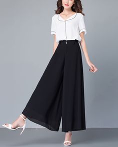 * Wide-leg skirt-shaped pants spun with high-quality chiffon fabric. * Wide waistband and A-line shape, make you look more taller and thinner. *Material: 100% chiffon *Let us know your regular size and overall height in your country. *The waist size and length can be customized. *Size: True to US size, can provide US 0 to US 20 , you can tell us your usual size and height when ordering. * Shipping: Free shipping Processing time: 5-7 working days Delivery time: 7-20 working days A Line Pants, Chic Chiffon Pants For Workwear, Chic Chiffon Pants For Work, Solid Chiffon Bottoms For Party, Black Chiffon Bottoms For Parties, Solid Chiffon Party Bottoms, Elegant Wide-leg Chiffon Bottoms, Black Flowy Chiffon Skirt Bottoms, Black Flowy Chiffon Bottoms