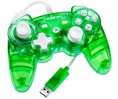 a close up of a green controller with a usb cable plugged in to it