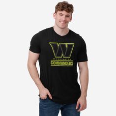 When your team shines bright, you should too! Get ready to glow on gameday with the Washington Commanders Highlight Reel T-Shirt. Features All-over black and neon design: This t-shirt is dark with highlighted features so you can shine bright on gameday and everyday Team logo display with highlight outline: The front of this apparel features a black team logo display outlined in neon pink, and a neon pink wordmark team name display so you can show off your team spirit with pride Crew neck rib col Washington Commanders, Logo Display, Neon Design, Team T Shirts, Black Neon, Team Name, Team Shirts, National Football League, Team Names