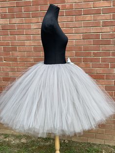 "This listing includes a Silver Bridal Tutu please select the length range that you would desire and make a note in the note to seller section of the length you would like to go with. Tutu pictured is a 34\" tutu Thank you for shopping with Princess Tutus Boutique. If you have any questions please feel free to convo us at anytime and we will get back with you just as soon as possible. We strive to have great customer service and quick response on all contacts and also we strive to have great tur Fitted Costume Petticoat For Halloween, Fitted Halloween Costume Petticoat, Fitted Petticoat For Halloween Costume, Fitted Carnival Dance Costume, Fitted Costume For Carnival Dance, Fitted Halloween Party Petticoat, White Skirt For Halloween Costume Party, Stretch Petticoat For Halloween Costumes, Fitted Skirt For Dance And Party Season