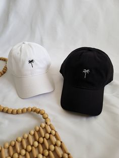 Personally embroidered for all tropical souls. Unstructured adjustable style for a comfortable fit. Cheap Embroidered Beach Hat, Cheap Beach Hats With Embroidered Logo, Casual Beach Visor Dad Hat, Cotton Snapback Hat For Vacation, Casual Beach Dad Hat Visor, Casual Visor Dad Hat For Beach, Casual Embroidered Baseball Cap For Beach, Casual Beach Baseball Cap With Embroidered Logo, Casual Cotton Baseball Cap For Beach