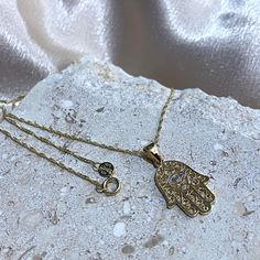 14k Solid Gold Hamsa Necklace, Real 14k Gold Hand of God Necklace, Hand of Fatima Necklace, 14k Gold Two Tone Color Evil Eye Necklace, Protection Necklace, Gift for him/her ★DETAILS★ (Pendant) - Material : 14k Solid Gold - Height : 21mm - Width : 11 mm - Weight : 0.9 gram ＊Weights and Dimensions are approximate (Chain) - Material : 14k Gold - Clasp: Spring Ring - Width: 0.9mm ＊Weights and Dimensions are approximate **If you are looking for different chain, Please Contact me:) Happy to help:) ★WHAT'S INCLUDED★ - 14k Gold Pendant Only or 14k Gold Pendant and 14k Gold Chain - Jewelry Pouch ★We will ship base on your ETSY provided address! So please check it carefully! NO ADDRESS CHANGE after placing the order Please check it carefully! ★LOST/ UNCLAIMED ITEM: Once it is being sent to USPS, we Spiritual Yellow Gold-plated Charm Necklaces, Spiritual 14k Gold-filled Yellow Gold Charm Necklace, Yellow Gold Evil Eye Pendant Necklace, Spiritual Gold Eye-shaped Necklace, Hamsa Necklace Gold, Gold Hamsa, Hamsa Necklace, Gold Chain Jewelry, Protection Necklace