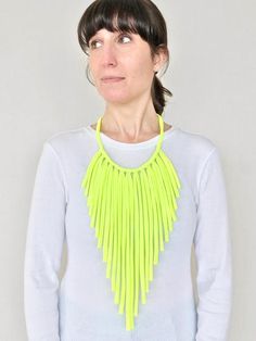 This vibrant necklace is very light, soft, and versatile you can wear it during the day or for an event in the evening, I can assure you it won´t disappoint you.What we love about this design is that you can adjust the length, just tie it to the height you want.• Length - 35 cms = 13,8"  app (longest fringe)• Colors - neon yellow, neon green, neon orange and neon fuchsia.• Material - 100% peruvian lycra cotton• Hand wash cold, hang dry100% handmade by BNN Thank you for stopping by! Neon Yellow Summer Beach Jewelry, Handmade Neon Yellow Jewelry For Summer, Yellow Choker Necklace For Summer, Yellow Summer Choker Necklace, Summer Party Long Necklaces, Handmade Neon Jewelry For The Beach, Handmade Bold Necklace For Party, Handmade Neon Jewelry For Summer, Bold Handmade Necklace For Party