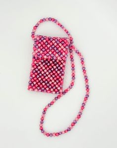 Super sweet and pink! This entire bag is beaded with pink and purple hearts and is such a fun way to brighten up any outfit. Flap closure and strap. $32 By Bari Lynn Pink Heart-shaped Shoulder Bag For Party, Summer Pink Beaded Bag, Summer Pink Beaded Shoulder Bag, Pink Shoulder Bag For Valentine's Day Gift, Purple Beaded Bags For Gifts, Purple Beaded Bag As Gift, Purple Beaded Bag For Gift, Pink Beaded Bag For Everyday Use, Valentine's Day Pink Bags With Adjustable Strap