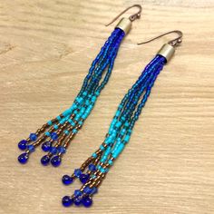 Bohemian Beaded Latkan Earrings For Beach, Bohemian Beaded Earrings With Latkans For Beach, Bohemian Beaded Latkans Earrings For Beach, Turquoise Fringe Beaded Earrings For Beach, Turquoise Tassel Earrings With Round Beads, Beaded Tassel Earrings For Beach, Blue Tassel Drop Earrings For Beach, Beach Earrings With Latkans, Blue Fringe Beaded Earrings For Beach