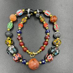 Beautiful Ancient Roman Mosaic glass old Carnelain agate stone Beads Necklace  1-Dear valued customers Please Feel Free to contact me With Any Question Or Requests  2- I hope you like Find Something you like in My shop  3- If you want custom order from an item if you want lot please contact me  3- I ship worldwide  I will send the order with 1 or 2 business days from the purchasing date to the address of the customer in etsy 4- All packages will Ship Via Thailand Rigester Air Mail Post will add Vintage Czech Glass Oval Beaded Necklace, Vintage Czech Glass Beaded Necklaces With Polished Beads, Bohemian Round Glass Necklaces, Vintage Czech Glass Beaded Necklaces With Round Beads, Vintage Czech Glass Beaded Necklace With Round Beads, Vintage Style Czech Glass Beaded Necklace, Handmade Spiritual Rondelle Beads, Oval Glass Gemstone Beads Jewelry, Bohemian Round Faceted Beads