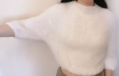 White Knitted Sweater Women, Very Fine Sweater, Short Knit Sweater, Cropped Knit Sweater, Fluffy Knit Sweater, Soft Sweater Our products are created according to customer's exact sizes. Every clothing is knitted with love. With personalization you can tell us your exact sizes. Handmade Materials: Premium Acrylic, Polyamide 30 degree Wash/ Hand Wash See more hand knitted products of our shop https://www.etsy.com/shop/TINAFASHIONSHOP White Knitted Sweater, Fluffy Knit, Sweater Cropped, Cropped Knit Sweater, White Knit Sweater, Soft Sweater, Pullover Sweater Women, Sweater Women, Softest Sweater