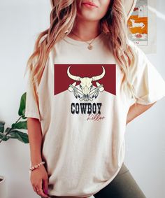 Cowboy Killers Shirt is an awesome product of western-style T-shirts, dark denim jeans, and cowboy boots, which is a typical style for country music stars. This Western Graphic Tee is a must-have for all cowgirls. With its Vintage-inspired design, this shirt is perfect for those who love the boho, western look. This is the perfect shirt for anyone who loves cowboy boots, country music, and Western shirts. Grab a pair of jeans and wear this Western graphic tee to show off your sense of style! Please review the size chart before buying a product. Select your shirt color using the following drop-down menu. Note that all sizes are UNISEX - check the Size Chart in Listing Photos The position, colors, and size of the prints may differ slightly from the illustrations. - We recommend turning our T Western Tshirt, Boots Country, Graphic Tee Vintage, Western Graphic Tees, Cowgirl Shirts, Country Music Stars, Western Look, Dark Denim Jeans, Western Boho