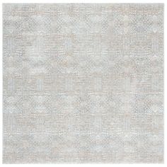 an area rug with white and grey colors