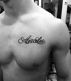 a man with a name tattoo on his chest