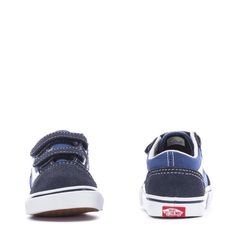 Keep your kids' look classic in the Vans Old Skool V toddlers' sneakers. Originating from the popular Old Skool, the Old Skool V features the same infamous sidestripe, suede uppers, and padded collars. These skate shoes go the long haul no matter what your day has in store. Two hook and loop straps for secure fit. Sturdy canvas and suede uppers. Re-enforced toecaps to withstand wear and tear. Midsole cushioning for all-day comfort. Padded collars for support and flexibility. Signature Vans waffl Navy Vans Sneakers With Round Toe, Vans Sneakers For Skateboarding, Vans Skateboarding Sneakers, Vans Low-top Sneakers For School, Sporty Vans Skate Shoes For School, Sporty Vans Sneakers For School, Sporty School Sneakers By Vans, Vans Sporty Non-slip Sneakers, Sporty Non-slip Vans Sneakers