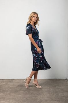 Wrap yourself in soft silk with our Lily wrap dress. No fuss- just easy, comfortable and high on style. Made in two custom prints, Midnight Floral and Palm. 100% silkDry Clean Only Model is 5'9" and wearing a size small Silk V-neck Wrap Dress For Date Night, Flowy Midi-length Wrap Dress With Tie Waist, Flowy Wrap Dress For Brunch, V-neck Rayon Midi Dress With Tie Waist, Flowy Wrap Dress With Tie Waist, Chic Printed Midi Dress With Surplice Neckline, Spring Surplice Neckline Rayon Wrap Dress, Spring Rayon Wrap Dress With Surplice Neckline, Flowy Faux Wrap Maxi Dress